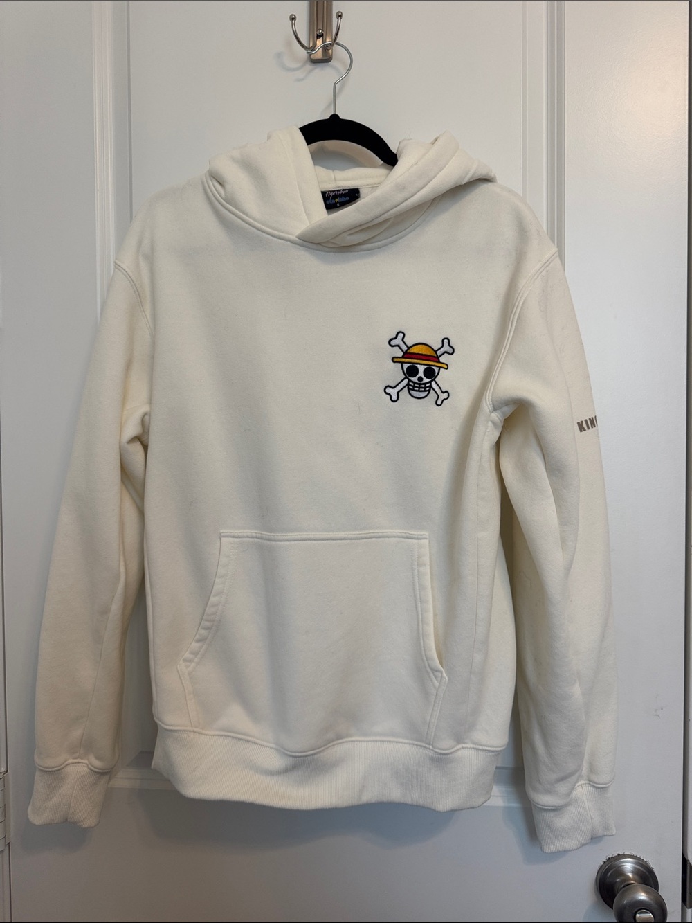 Unisex Cream Hoodie with Skull & Straw Hat Embroidery